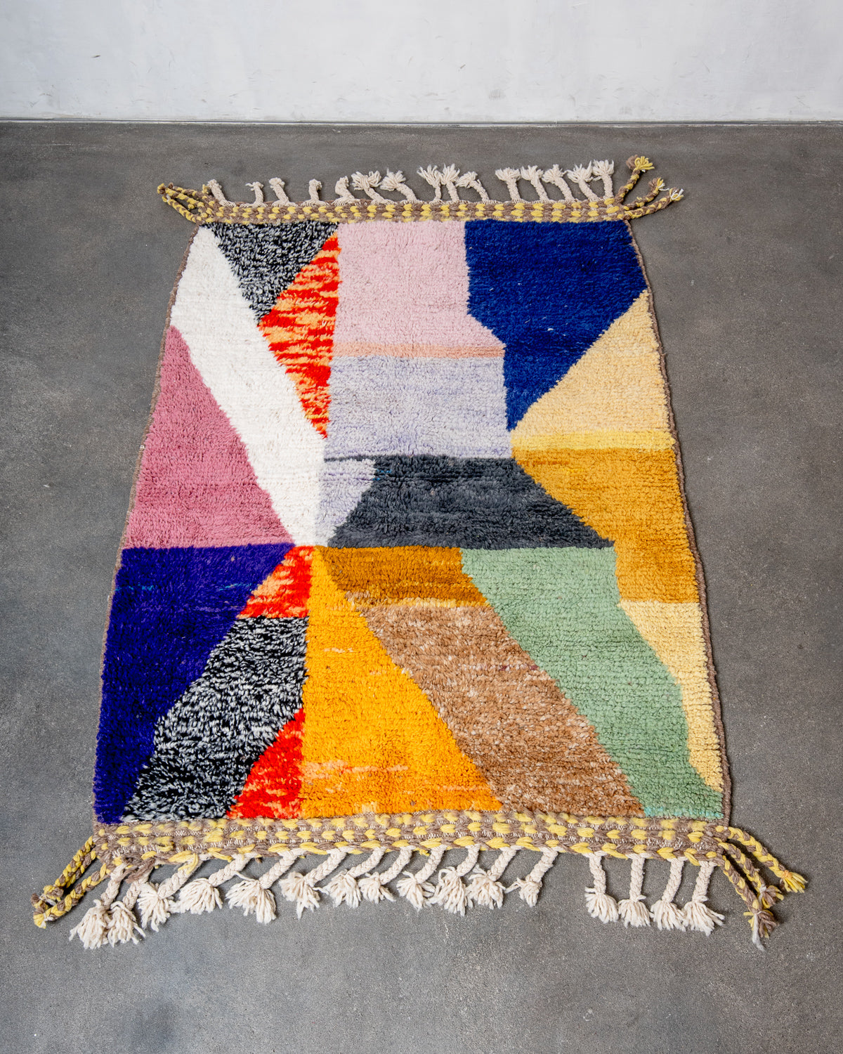 Modern, designer, handcrafted Berber rug from Morocco. Beniourain carpet with beautiful colours and patterns and fluffy wool texture.